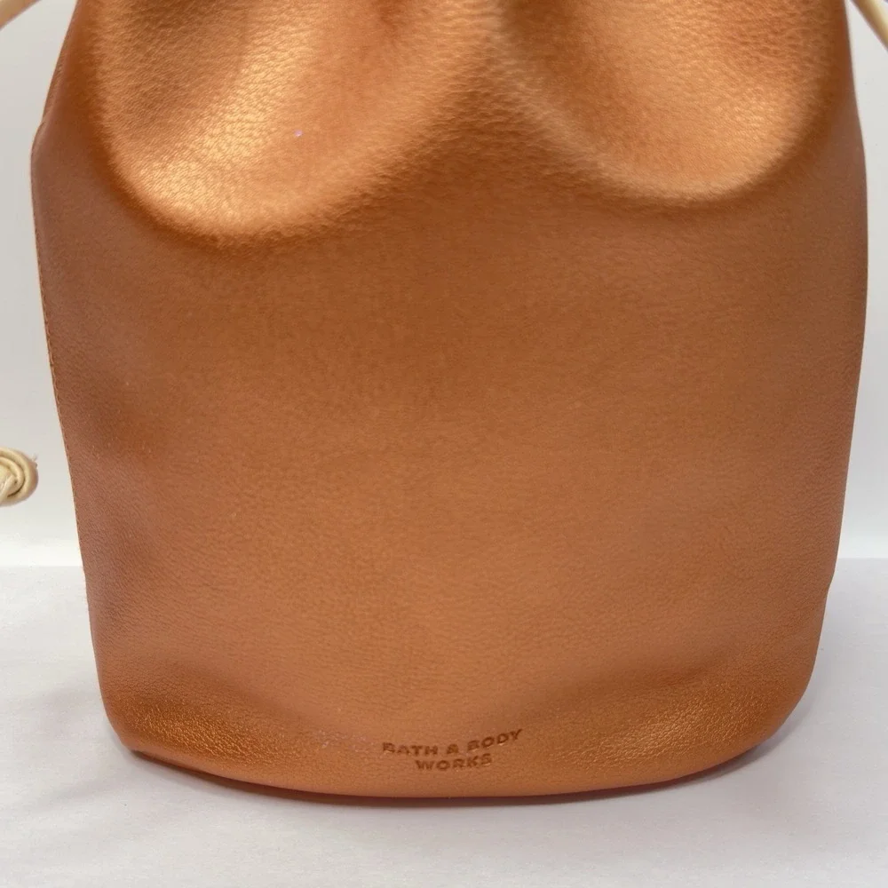 Bath Body Bath metallic penny copper color with Tan Drawstring Bag